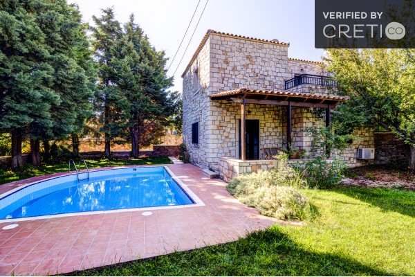 A traditional villa with pool and modern comforts