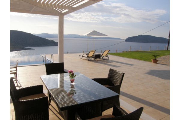 The spacious veranda has panoramic view of  the impressive bay of Mirabello.