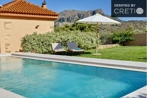 Traditional holiday villas complex with mountain view