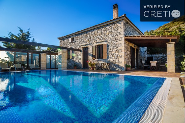 The outdoor area of this traditional villa in Platanos village